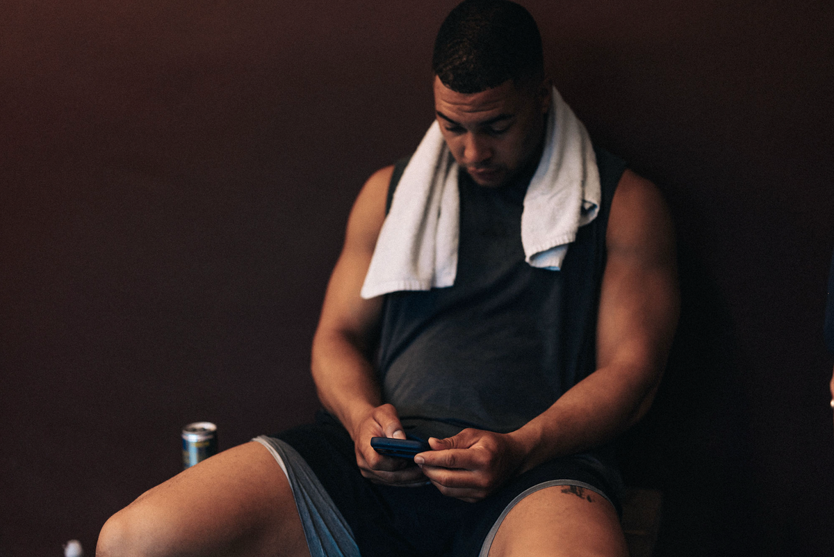 Hero: end of a hard session, sitting on the gym floor