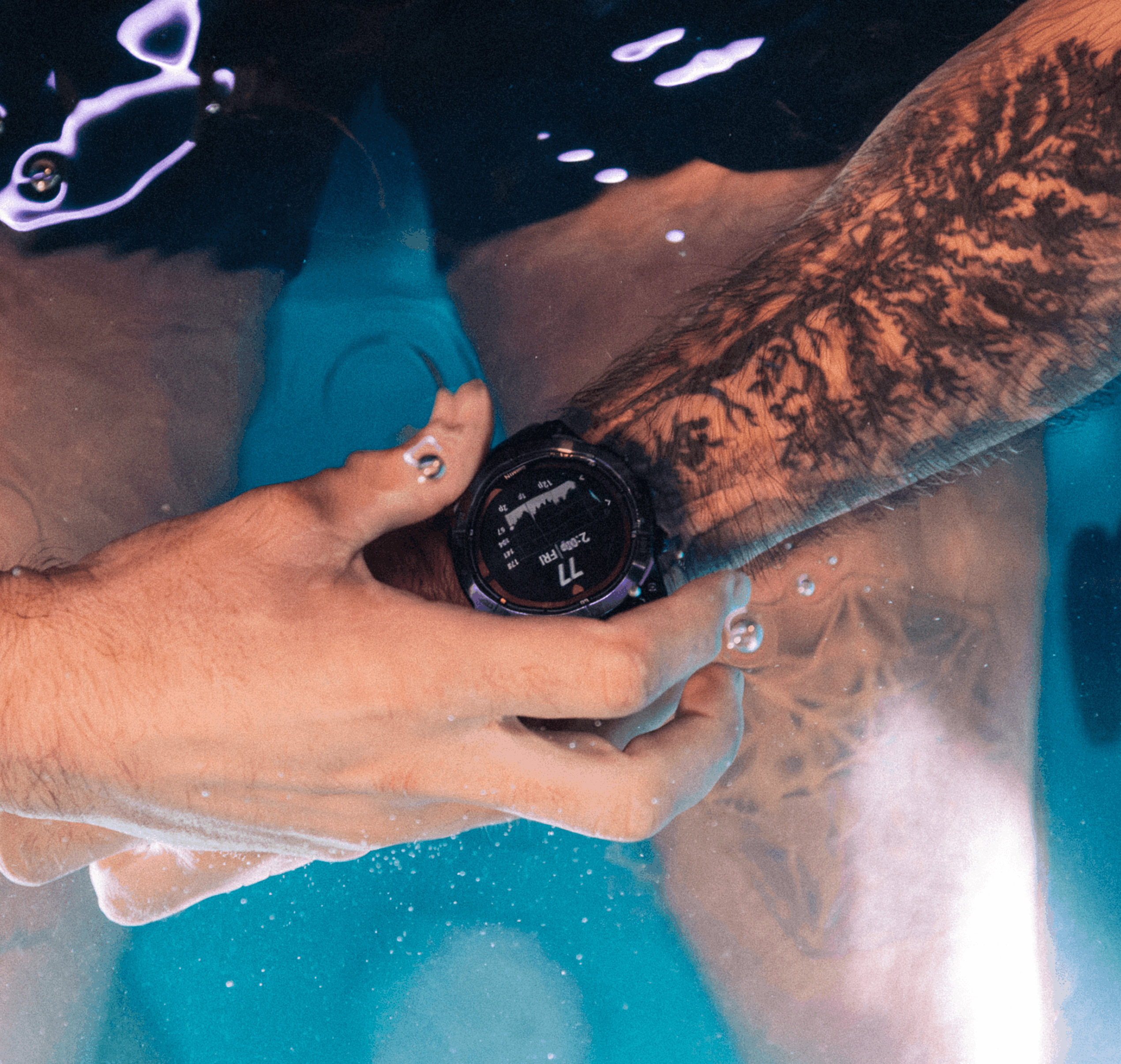 wearing a black rugged smartwatch