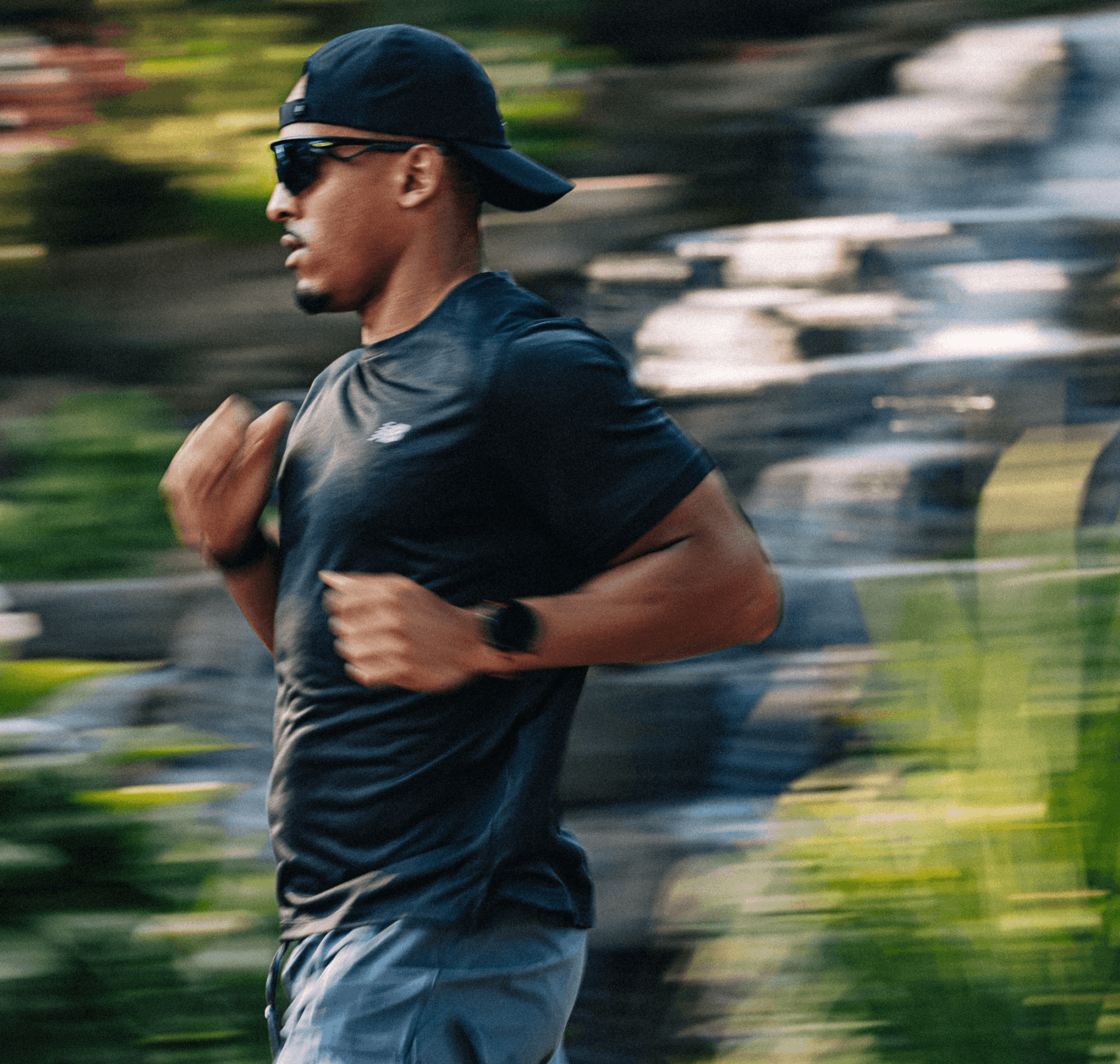 wearing a dark navy athletic t-shirt,